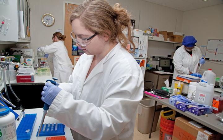 forensic science student in lab